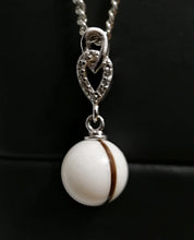 Charger l'image dans la galerie, Élégant Pendentif Shawna en argent doté d'une gemme sphérique blanche scintillante ornée d'un petit croissant étincelant de zircons, suspendu à une chaîne délicate, de Bijoux La Précieuse.